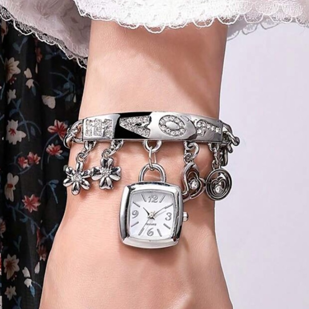 Brand New Love bracelet with dangling pedants